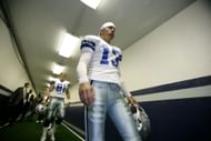 Kicker Mike Vanderjagt and long snapper L.P. Ladouceur walk down the team tunnel